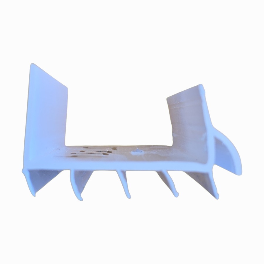 White four-fin vinyl door sweep profile with a wide channel