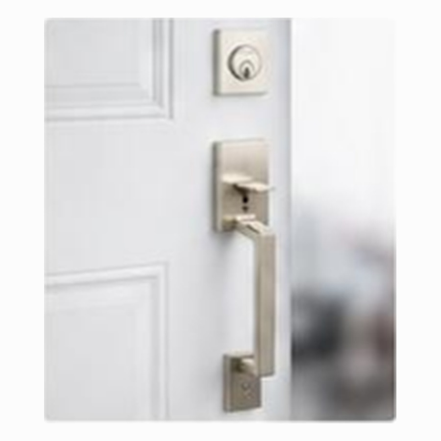 Taymor straight grip set handleset in satin nickel installed on a white entry door