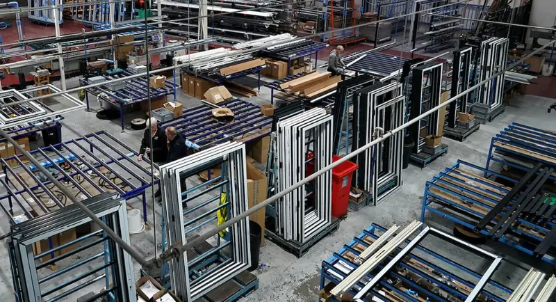 Window and door manufacturing floor with assembly workstations